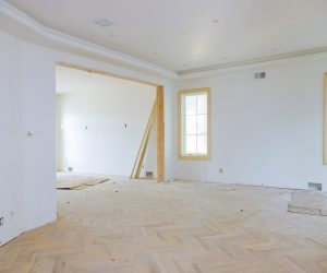 Interior construction of housing of empty apartment with white wall
